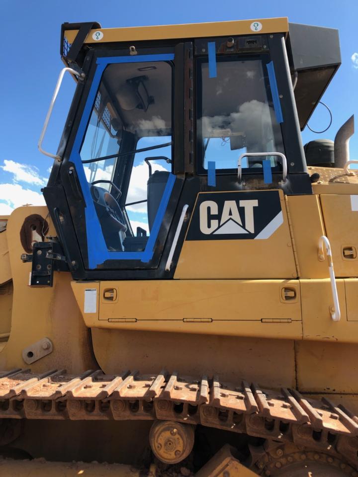 E.A. Glass heavy duty glass service, CAT Dozer Cab